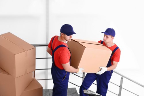 Specialist movers preparing a piano removal in a Knightsbridge property