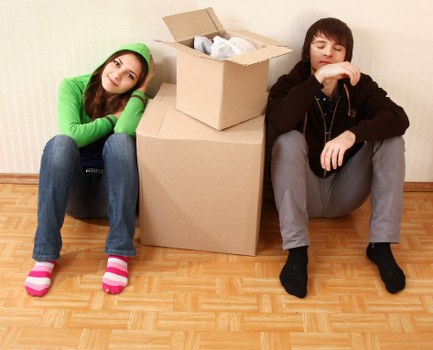 Professional movers loading furniture into a removal van in Knightsbridge