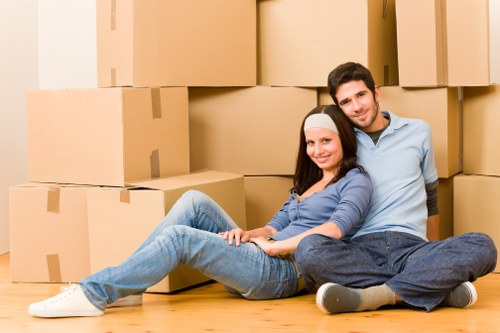Removal team handling luxury household items in Knightsbridge