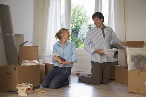 Staff handling furniture with care in a Knightsbridge removal